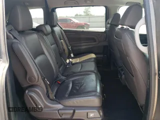 2019 Honda Odyssey Touring z VIN 5FNRL6H87KB098010, wystawiony jako Copart lot #54791505 z przebiegiem 94 477 mil mil oraz Szkoda całkowita • Salvage title. Historia ofert i sprzedaży dostępna na DreamBid. Obrazek 11.