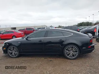 2016 Audi A7 3.0 Premium Plus with VIN WAUWGAFCXGN075389, listed as a IAAI auction lot 41285994 with 83,032 mi miles. Bid and sale history available at carsss.com. Image 14.