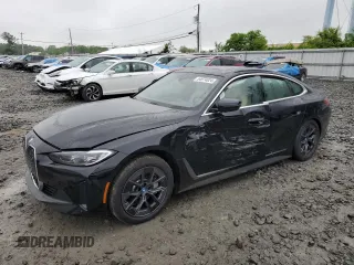 2024 BMW i4 eDrive35 with VIN WBY43AW05RFS84773, listed as a Copart auction lot 54974024 with 2,942 mi miles and Salvage Title. Bid and sale history available at carsss.com. Image 1.