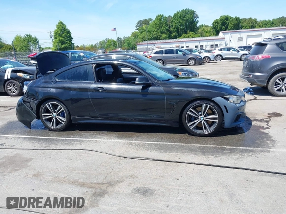 2015 BMW 4 Series 435i with VIN WBA3R1C56FK194060, listed as a IAAI auction lot 42061619 with 153,384 mi miles and . Bid and sale history available at DreamBid. Image 13.