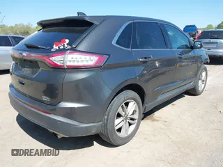 2016 Ford Edge SEL z VIN 2FMPK4J96GBB18054, wystawiony jako IAAI lot #42031225 z przebiegiem 167 461 mil mil oraz . Historia ofert i sprzedaży dostępna na DreamBid. Obrazek 4.