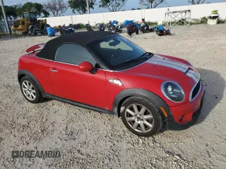 2013 MINI Roadster S z VIN WMWSY3C56DT593875, wystawiony jako Copart lot #74982124 z przebiegiem 64 622 mil mil oraz Szkody całkowita. Historia ofert i sprzedaży dostępna na DreamBid. Obrazek 4.