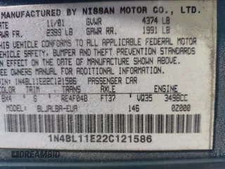 2002 Nissan Altima SE with VIN 1N4BL11E22C121586, listed as a IAAI auction lot 41409205 with 213,720 mi miles. Bid and sale history available at carsss.com. Image 9.