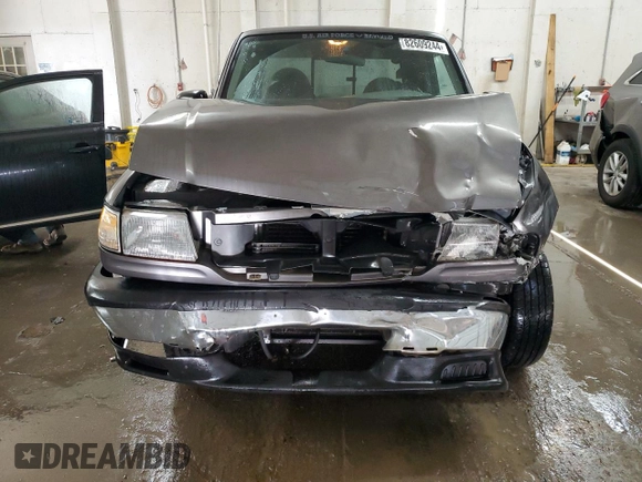 2000 Mazda B-Series 2WD Truck SE with VIN 4F4YR16V8YTM12086, listed as a Copart auction lot 82609244 with 297,354 mi miles and Salvage Title. Bid and sale history available at carsss.com. Image 5.