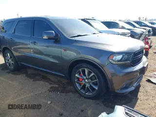 2014 Dodge Durango R/T z VIN 1C4SDJCT5EC591649, wystawiony jako IAAI lot #42346947 z przebiegiem 143 143 mil mil oraz . Historia ofert i sprzedaży dostępna na DreamBid. Obrazek 1.