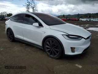 2016 Tesla Model X 70D with VIN 5YJXCAE28GF017100, listed as a Copart auction lot 50081235 with 126,962 mi miles and Salvage Title. Bid and sale history available at DreamBid. Image 4.