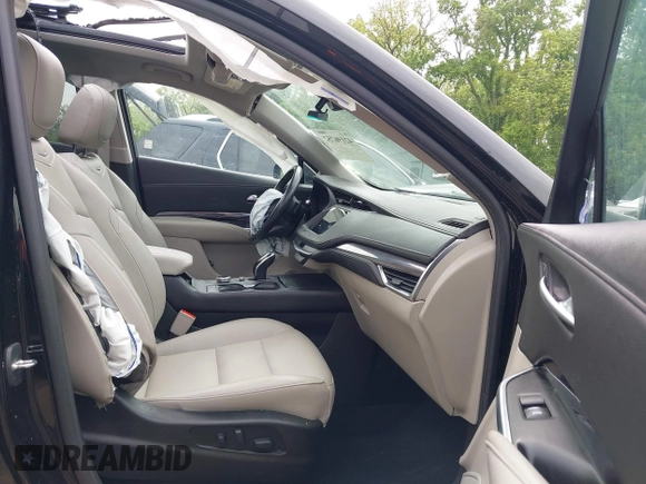 2021 Cadillac XT4 FWD Luxury with VIN 1GYAZAR44MF004295, listed as a IAAI auction lot 42196752 with 69,311 mi miles and . Bid and sale history available at DreamBid. Image 5.