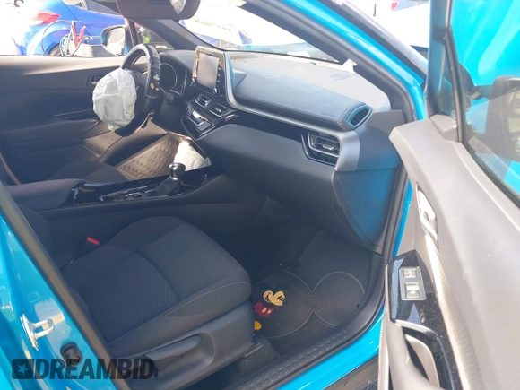 2019 Toyota C-HR XLE with VIN NMTKHMBX6KR097934, listed as a IAAI auction lot 39276687 with 56,973 mi miles. Bid and sale history available at carsss.com. Image 5.