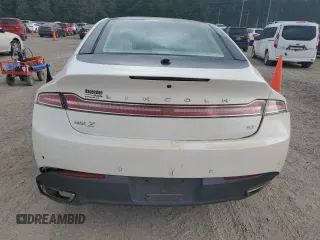 2014 Lincoln MKZ z VIN 3LN6L2GK9ER825882, wystawiony jako Copart lot #53332435 z przebiegiem 114 677 mil mil oraz Szkoda całkowita • Salvage title. Historia ofert i sprzedaży dostępna na DreamBid. Obrazek 6.