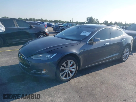 2015 Tesla Model S 85D with VIN 5YJSA1H46FF082264, listed as a IAAI auction lot 42068959 with 98,693 mi miles. Bid and sale history available at carsss.com. Image 2.