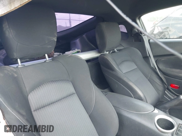 2015 Nissan 370Z z VIN JN1AZ4EH2FM442556, wystawiony jako IAAI lot #41956287 z przebiegiem 128 769 mil mil oraz . Historia ofert i sprzedaży dostępna na DreamBid. Obrazek 8.