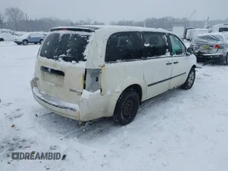 2009 Dodge Grand Caravan with VIN 2D8HN11E19R703857, listed as a IAAI auction lot 41195565 with 199,776 mi miles and . Bid and sale history available at DreamBid. Image 4.
