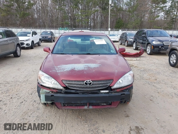2002 Toyota Camry LE z VIN 4T1BE32K82U005531, wystawiony jako IAAI lot #41650283 z przebiegiem 328 259 mil mil oraz . Historia ofert i sprzedaży dostępna na DreamBid. Obrazek 13.