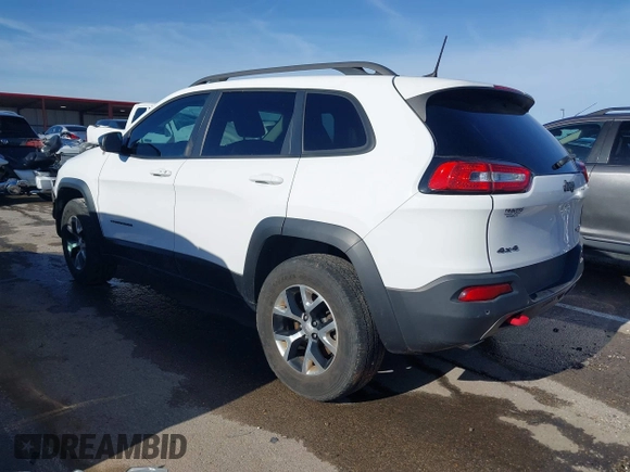 2018 Jeep Cherokee Trailhawk with VIN 1C4PJMBX7JD550173, listed as a IAAI auction lot 41094306 with 74,128 mi miles. Bid and sale history available at carsss.com. Image 3.