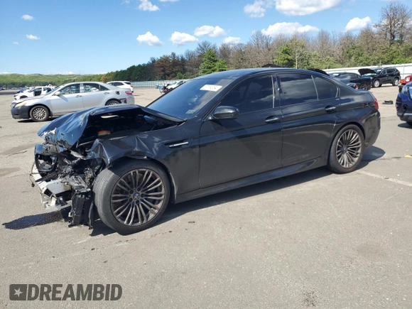 2014 BMW M5 z VIN WBSFV9C53ED594132, wystawiony jako Copart lot #67114384 z przebiegiem 89 020 mil mil oraz Szkoda całkowita • Salvage title. Historia ofert i sprzedaży dostępna na DreamBid. Obrazek 1.