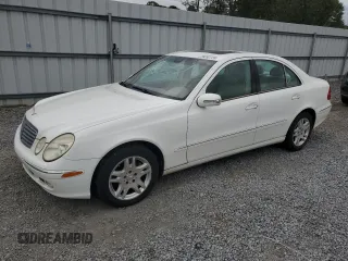 2003 Mercedes-Benz E-Class 3.2L with VIN WDBUF65JX3A316975, listed as a Copart auction lot 79232724 with 200,670 mi miles and Salvage Title. Bid and sale history available at carsss.com. Image 1.