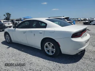 2019 Dodge Charger SXT with VIN 2C3CDXBG2KH664761, listed as a Copart auction lot 54741055 with 82,772 mi miles and Salvage Title. Bid and sale history available at DreamBid. Image 2.