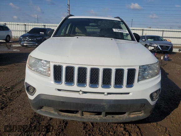 2011 Jeep Compass Latitude with VIN 1J4NT1FA2BD230700, listed as a Copart auction lot 77046644 with 93,502 mi miles and Salvage Title. Bid and sale history available at carsss.com. Image 5.