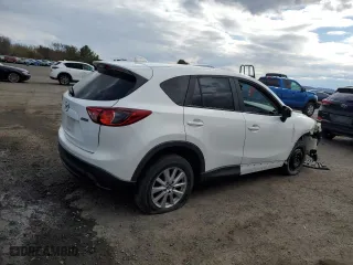 2015 Mazda CX-5 Sport with VIN JM3KE4BY9F0482410, listed as a Copart auction lot 50517175 with 195,709 mi miles and Salvage Title. Bid and sale history available at carsss.com. Image 3.
