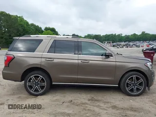 2019 Ford Expedition Limited with VIN 1FMJU1KT7KEA22116, listed as a IAAI auction lot 42276020 with 104,557 mi miles and . Bid and sale history available at DreamBid. Image 13.