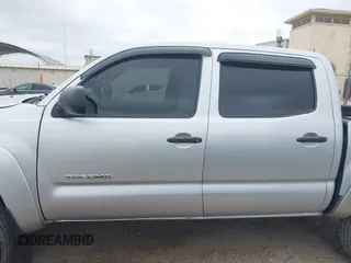 2007 Toyota Tacoma PreRunner z VIN 3TMJU62N37M033683, wystawiony jako IAAI lot #42383346 z przebiegiem 138 683 mil mil oraz . Historia ofert i sprzedaży dostępna na DreamBid. Obrazek 14.