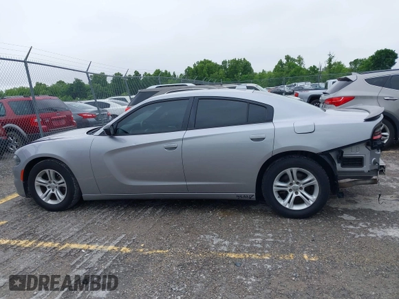 2015 Dodge Charger SXT with VIN 2C3CDXHG1FH886088, listed as a IAAI auction lot 42331369 with 119,659 mi miles and . Bid and sale history available at DreamBid. Image 14.