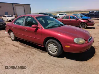 1997 Mercury Sable GS with VIN 1MELM50U2VA600052, listed as a Copart auction lot 58556795 with 65,848 mi miles and Salvage title. Bid and sale history available at DreamBid. Image 4.