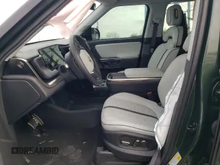 2024 Rivian R1T Adventure z VIN 7FCTGCAA1RN030829, wystawiony jako Copart lot #81459854 z przebiegiem Nie podano mil oraz Szkody całkowita. Historia ofert i sprzedaży dostępna na DreamBid. Obrazek 7.