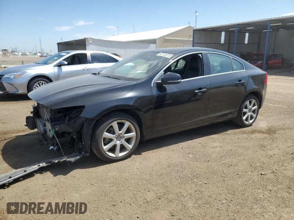 2016 Volvo S60 T5 Premier with VIN YV1612TKXG2402195, listed as a Copart auction lot 60140015 with 105,540 mi miles and Salvage title. Bid and sale history available at DreamBid. Image 1.
