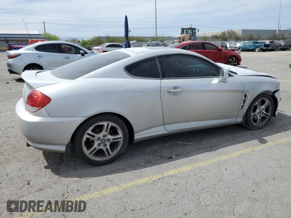 2006 Hyundai Tiburon GT z VIN KMHHN65F06U203701, wystawiony jako Copart lot #52374135 z przebiegiem 90 796 mil mil oraz Szkody całkowita. Historia ofert i sprzedaży dostępna na DreamBid. Obrazek 3.