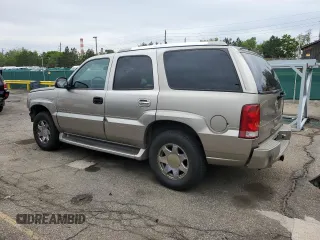 2003 Cadillac Escalade z VIN 1GYEK63N03R217374, wystawiony jako Copart lot #58380765 z przebiegiem 212 454 mil mil oraz Szkoda całkowita • Salvage title. Historia ofert i sprzedaży dostępna na DreamBid. Obrazek 2.