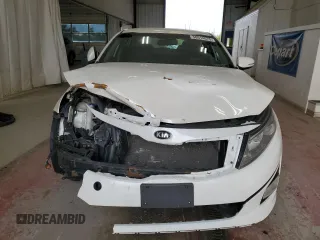 2015 Kia Optima LX z VIN KNAGM4A78F5616317, wystawiony jako Copart lot #58514075 z przebiegiem 123 657 mil mil oraz Szkoda całkowita • Salvage title. Historia ofert i sprzedaży dostępna na DreamBid. Obrazek 5.
