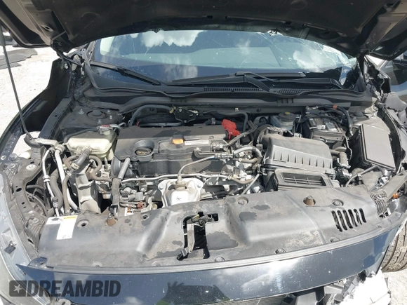 2020 Honda Civic LX z VIN 2HGFC2F61LH600469, wystawiony jako IAAI lot #41958201 z przebiegiem 66 249 mil mil oraz . Historia ofert i sprzedaży dostępna na DreamBid. Obrazek 10.