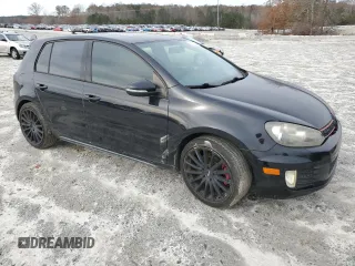 2012 Volkswagen GTI z VIN WVWHV7AJ3CW014643, wystawiony jako Copart lot #82768644 z przebiegiem 125 403 mil mil oraz Czysty tytuł • Clean title. Historia ofert i sprzedaży dostępna na DreamBid. Obrazek 4.