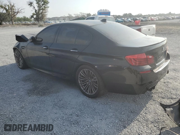 2014 BMW M5 z VIN WBSFV9C53ED594132, wystawiony jako Copart lot #56479355 z przebiegiem 89 020 mil mil oraz Szkody całkowita. Historia ofert i sprzedaży dostępna na DreamBid. Obrazek 2.
