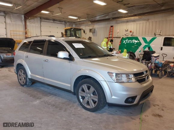 2014 Dodge Journey Limited with VIN 3C4PDDDG4ET175007, listed as a IAAI auction lot 41888742 with 218,585 mi miles. Bid and sale history available at carsss.com. Image 1.