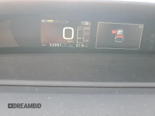 2021 Toyota Prius L Eco z VIN JTDKAMFU4M3145800, wystawiony jako Copart lot #59180285 z przebiegiem 33 991 mil mil oraz Czysty tytuł • Clean title. Historia ofert i sprzedaży dostępna na DreamBid. Obrazek 9.
