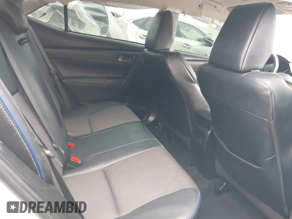 2019 Toyota Corolla L with VIN 5YFBURHE5KP877691, listed as a IAAI auction lot 42108591 with 85,813 mi miles and . Bid and sale history available at DreamBid. Image 8.
