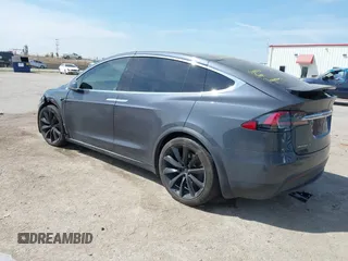 2017 Tesla Model X 90D with VIN 5YJXCBE22HF079194, listed as a IAAI auction lot 41895591 with 102,437 mi miles and . Bid and sale history available at DreamBid. Image 3.