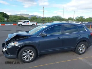 2014 Mazda CX-9 Sport with VIN JM3TB3BAXE0442006, listed as a IAAI auction lot 41430742 with 82,682 mi miles and . Bid and sale history available at DreamBid. Image 6.
