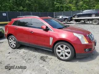 2016 Cadillac SRX Premium Collection with VIN 3GYFNDE3XGS508897, listed as a Copart auction lot 57886515 with 163,477 mi miles and Salvage title. Bid and sale history available at DreamBid. Image 4.