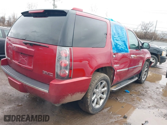 2013 GMC Yukon Denali with VIN 1GKS1EEFXDR314454, listed as a IAAI auction lot 41691051 with 141,612 mi miles. Bid and sale history available at carsss.com. Image 4.