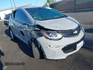 2020 Chevrolet Bolt EV LT z VIN 1G1FW6S03L4116162, wystawiony jako IAAI lot #42214832 z przebiegiem 24 849 mil mil oraz . Historia ofert i sprzedaży dostępna na DreamBid. Obrazek 1.
