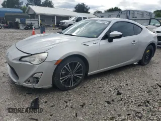 2013 Scion FR-S with VIN JF1ZNAA10D1700449, listed as a Copart auction lot 55590565 with 120,209 mi miles and Salvage Title. Bid and sale history available at carsss.com. Image 1.