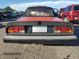 1983 Alfa Romeo Spider Veloce z VIN ZARBA5413D1017001, wystawiony jako Copart lot #68685714 z przebiegiem 71 738 mil mil oraz Szkody całkowita. Historia ofert i sprzedaży dostępna na DreamBid. Obrazek 6.