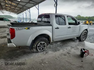 2018 Nissan Frontier SV with VIN 1N6AD0EV6JN744362, listed as a Copart auction lot 58524385 with 117,667 mi miles and Salvage title. Bid and sale history available at DreamBid. Image 3.