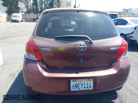 2010 Toyota Yaris with VIN JTDJT4K38A5324103, listed as a IAAI auction lot 41964619 with 149,874 mi miles. Bid and sale history available at carsss.com. Image 12.