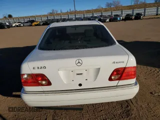 1999 Mercedes-Benz E-Class with VIN WDBJF82H1XX024280, listed as a Copart auction lot 83213204 with 212,712 mi miles and Salvage Title. Bid and sale history available at carsss.com. Image 6.
