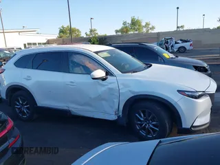 2018 Mazda CX-9 Sport with VIN JM3TCABY8J0204499, listed as a IAAI auction lot 42374933 with 114,408 mi miles and . Bid and sale history available at DreamBid. Image 13.