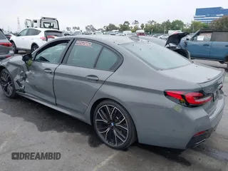 2022 BMW 5 Series M550i xDrive with VIN WBA13BK07NCL07995, listed as a IAAI auction lot 42454963 with 12,721 mi miles and . Bid and sale history available at DreamBid. Image 3.